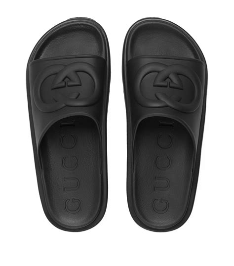 gucci mens black slides|men gucci interlocking slides.